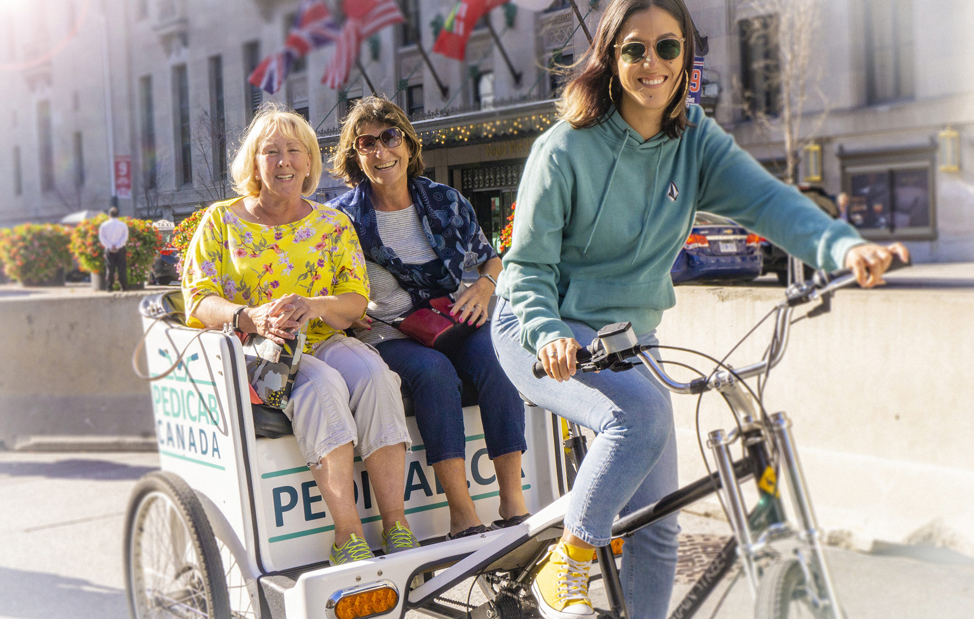 Ladies using Pedicab Canada Union Station Toronto